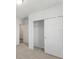 Spacious bedroom closet with sliding doors and shelving at 5174 Minneola Ln, Saint Cloud, FL 34772