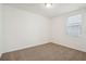 Bright bedroom with neutral walls and carpeted floors at 5186 Minneola Ln, Saint Cloud, FL 34772