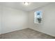 Bright bedroom with neutral walls and tile floors at 5186 Minneola Ln, Saint Cloud, FL 34772