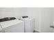 Laundry room with Whirlpool washer and dryer at 5186 Minneola Ln, Saint Cloud, FL 34772