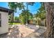 Large brick patio, string lights, and lush landscaping at 2916 Oxford St, Orlando, FL 32803