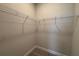 Spacious walk-in closet with wire shelving, providing ample storage space at 3255 Roseville Dr, Apopka, FL 32712