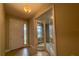 Bright foyer with tile flooring and an office featuring French doors at 3263 Roseville Dr, Apopka, FL 32712