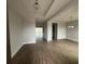 Hallway with wood-look floors leading to other rooms at 3279 Roseville Dr, Apopka, FL 32712