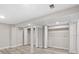 Finished basement featuring wood-look flooring and closet with double doors and ample space at 1822 Se 8Th St, Ocala, FL 34471