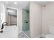 Modern bathroom featuring stylish tile floors, glass-enclosed shower, and black hardware at 1822 Se 8Th St, Ocala, FL 34471
