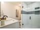 Stylish bathroom featuring a glass enclosed shower, double vanity, and modern fixtures at 1822 Se 8Th St, Ocala, FL 34471