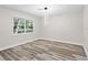 Bright, spacious bedroom with lots of natural light and vinyl floors at 1822 Se 8Th St, Ocala, FL 34471