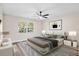 Serene bedroom with hardwood floors, and modern decor creates a cozy retreat at 1822 Se 8Th St, Ocala, FL 34471