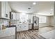 Bright kitchen with stainless steel appliances, quartz countertops, and ample storage space at 1822 Se 8Th St, Ocala, FL 34471