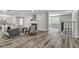 Inviting living room with fireplace and lots of natural light creates a warm ambiance at 1822 Se 8Th St, Ocala, FL 34471