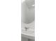 Simple bathroom with a round mirror and white sink at 424 Wayland Dr, Haines City, FL 33844