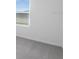 Bedroom with window, neutral wall, and grey carpet at 424 Wayland Dr, Haines City, FL 33844