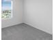 Bright bedroom with a window and neutral decor at 424 Wayland Dr, Haines City, FL 33844