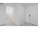 Open entryway with tile floor and laundry room access at 424 Wayland Dr, Haines City, FL 33844