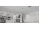 Modern kitchen with gray cabinets, island and stainless steel appliances at 424 Wayland Dr, Haines City, FL 33844