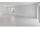 Bright and spacious living room with tile flooring and sliding doors to patio at 424 Wayland Dr, Haines City, FL 33844