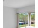 Living room with sliding glass doors leading to backyard patio at 424 Wayland Dr, Haines City, FL 33844