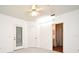 Light-filled bedroom with a patio door and adjacent bathroom at 570 Cranes Way # 248, Altamonte Springs, FL 32701