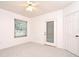 Bedroom with window, back door and neutral carpet at 570 Cranes Way # 248, Altamonte Springs, FL 32701