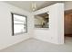 Light filled dining area with a window and passthrough to the kitchen at 570 Cranes Way # 248, Altamonte Springs, FL 32701