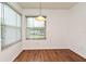 Well-lit dining room with modern fixtures and wood flooring at 570 Cranes Way # 248, Altamonte Springs, FL 32701