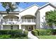 Attractive condo building featuring a well-maintained lawn and inviting entryway at 570 Cranes Way # 248, Altamonte Springs, FL 32701
