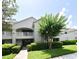 Exterior view of the property with well-maintained landscaping and a private entrance at 570 Cranes Way # 248, Altamonte Springs, FL 32701