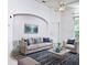 Bright living room boasts neutral decor, stylish furniture, and an airy ambiance perfect for relaxing and entertaining at 570 Cranes Way # 248, Altamonte Springs, FL 32701