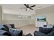 Cozy loft featuring comfortable seating and a ceiling fan at 2685 Star Grass Cir, Kissimmee, FL 34746