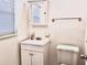 Clean bathroom with vanity, toilet, and medicine cabinet at 858 Darwin Dr, Altamonte Springs, FL 32701