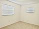 Simple bedroom with neutral walls and carpeting at 858 Darwin Dr, Altamonte Springs, FL 32701