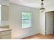 Simple dining area with wood flooring and a chandelier at 858 Darwin Dr, Altamonte Springs, FL 32701