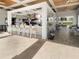 Poolside bar with seating, televisions and open air access at 8938 Cabot Cliffs Dr, Davenport, FL 33896