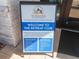 Community sign for The Retreat Club at ChampionsGate, highlighting amenities and important information for guests at 8938 Cabot Cliffs Dr, Davenport, FL 33896
