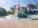 A fun splash pad with slides and a tipping bucket in this Gathering-friendly community at 8938 Cabot Cliffs Dr, Davenport, FL 33896