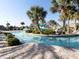 A water park with palm trees and plenty of shade for Gathering enjoyment at 8938 Cabot Cliffs Dr, Davenport, FL 33896