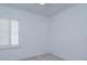Well-lit bedroom with white plantation shutters and neutral paint colors at 2072 Hartz Aly, Orlando, FL 32814