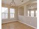 Bright dining room with tile flooring, neutral walls, and a decorative chandelier at 2072 Hartz Aly, Orlando, FL 32814