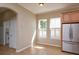 Cozy breakfast nook near stainless steel appliances and bright windows at 2072 Hartz Aly, Orlando, FL 32814