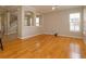 Spacious living room featuring hardwood floors and natural light at 2072 Hartz Aly, Orlando, FL 32814