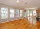 Expansive living space with hardwood floors connecting to the kitchen at 2072 Hartz Aly, Orlando, FL 32814