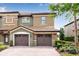 Charming townhome with two-car garage and well-maintained landscaping at 8930 Azalea Sands Ln, Davenport, FL 33896