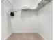 Spacious walk-in closet with shelving, rods, and carpeted floor at 8930 Azalea Sands Ln, Davenport, FL 33896