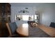 Cozy dining area with views to the kitchen and natural light at 3276 Candle Ridge Ct # 202, Orlando, FL 32822