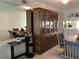 Open-concept living space featuring stylish furnishings and natural light at 3276 Candle Ridge Ct # 202, Orlando, FL 32822