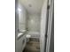 Clean bathroom with granite countertop, white vanity, and bathtub at 538 S Adelle Ave, Deland, FL 32720