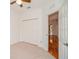 Carpeted bedroom with a ceiling fan and closet at 2657 Queen Mary Pl, Maitland, FL 32751