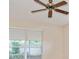 Bedroom view featuring a ceiling fan and window at 2657 Queen Mary Pl, Maitland, FL 32751