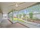 Screened-in patio with views of the backyard landscaping at 2657 Queen Mary Pl, Maitland, FL 32751